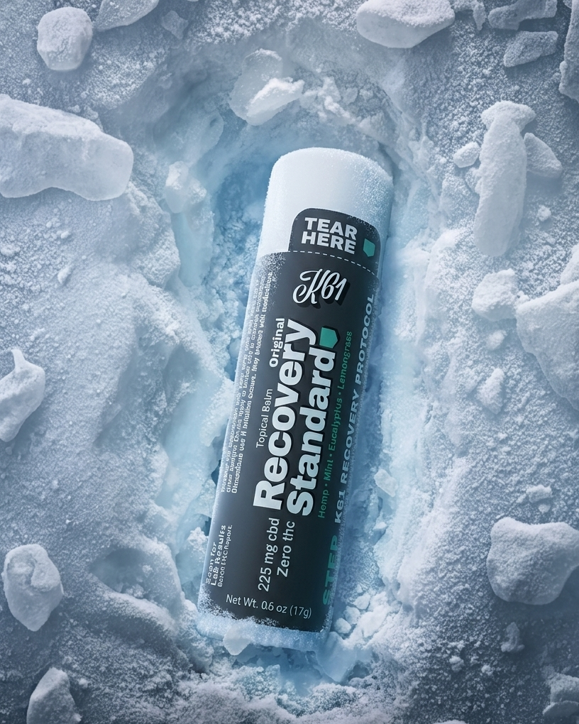 K61 Recovery Standard topical balm stick set into cracked ice, 225mg CBD, Zero THC, 0.6 oz